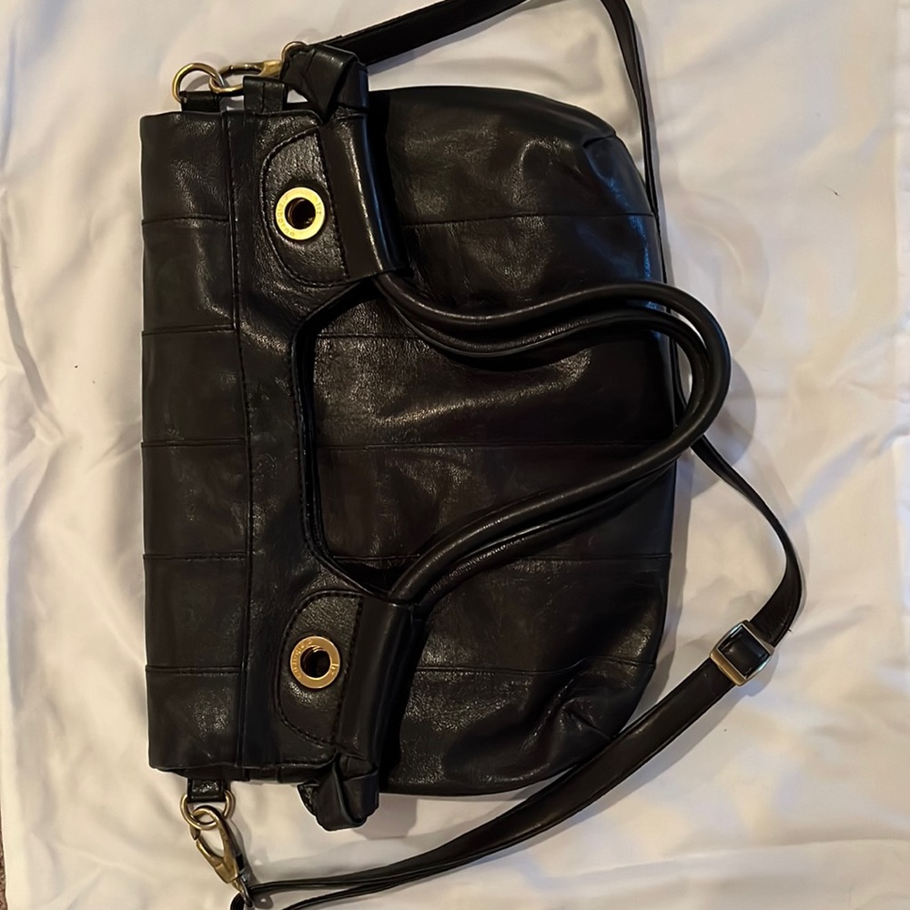 Black fold over style hand bag